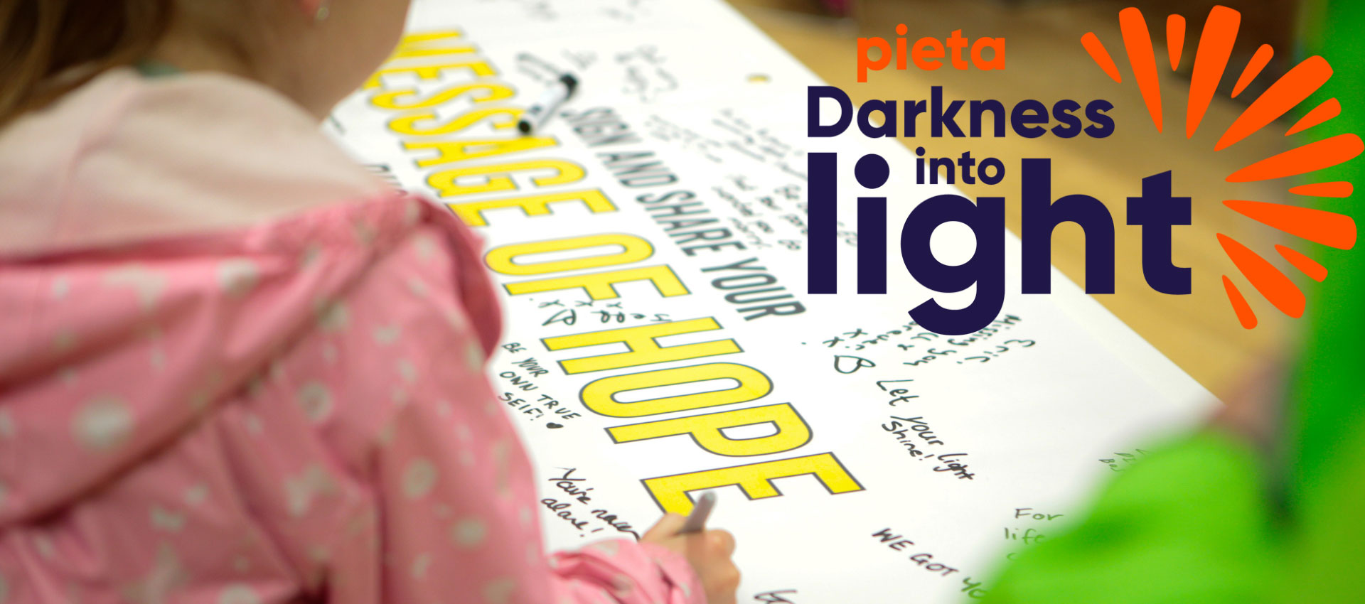 Darkness into light logo