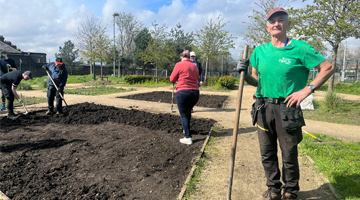 Image for man with shovel at Grangegorman Community Garden