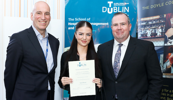 Image of one of the tourism & hospitality students receiving their award at the Student Excellence Awards