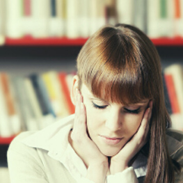 A student studying in the library