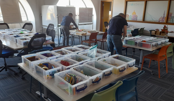 TU Dublin staff preparing packs for Climate Entrepreneurship Participants