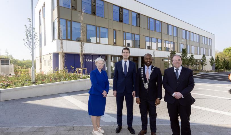 A group of people outside a building