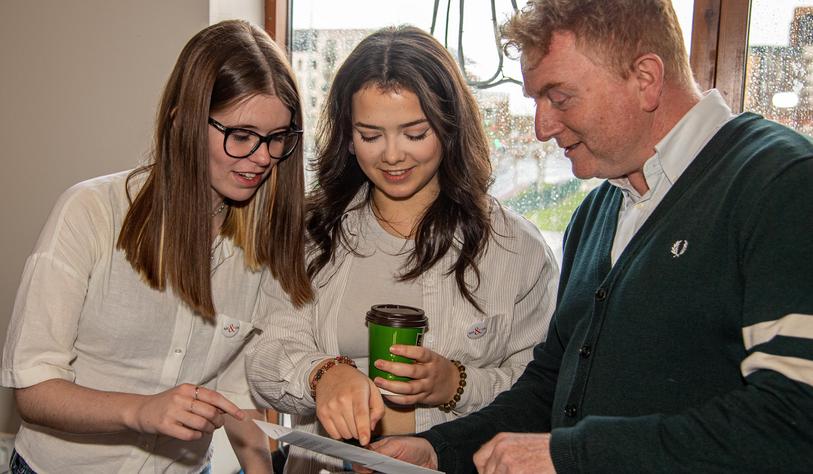 students Sorcha McIvor and Erin Fagan with dr glenn doyle