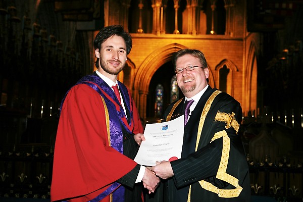 jonathan evans and brian norton graduation photo